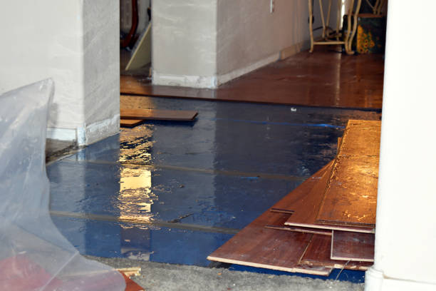 Professional Flood Damage Restoration technician working in Atwater, OH